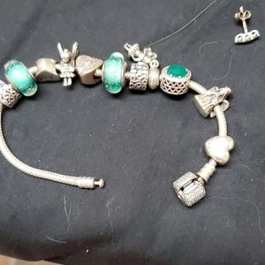 Pandora bracelet with  Authentic charms some charm